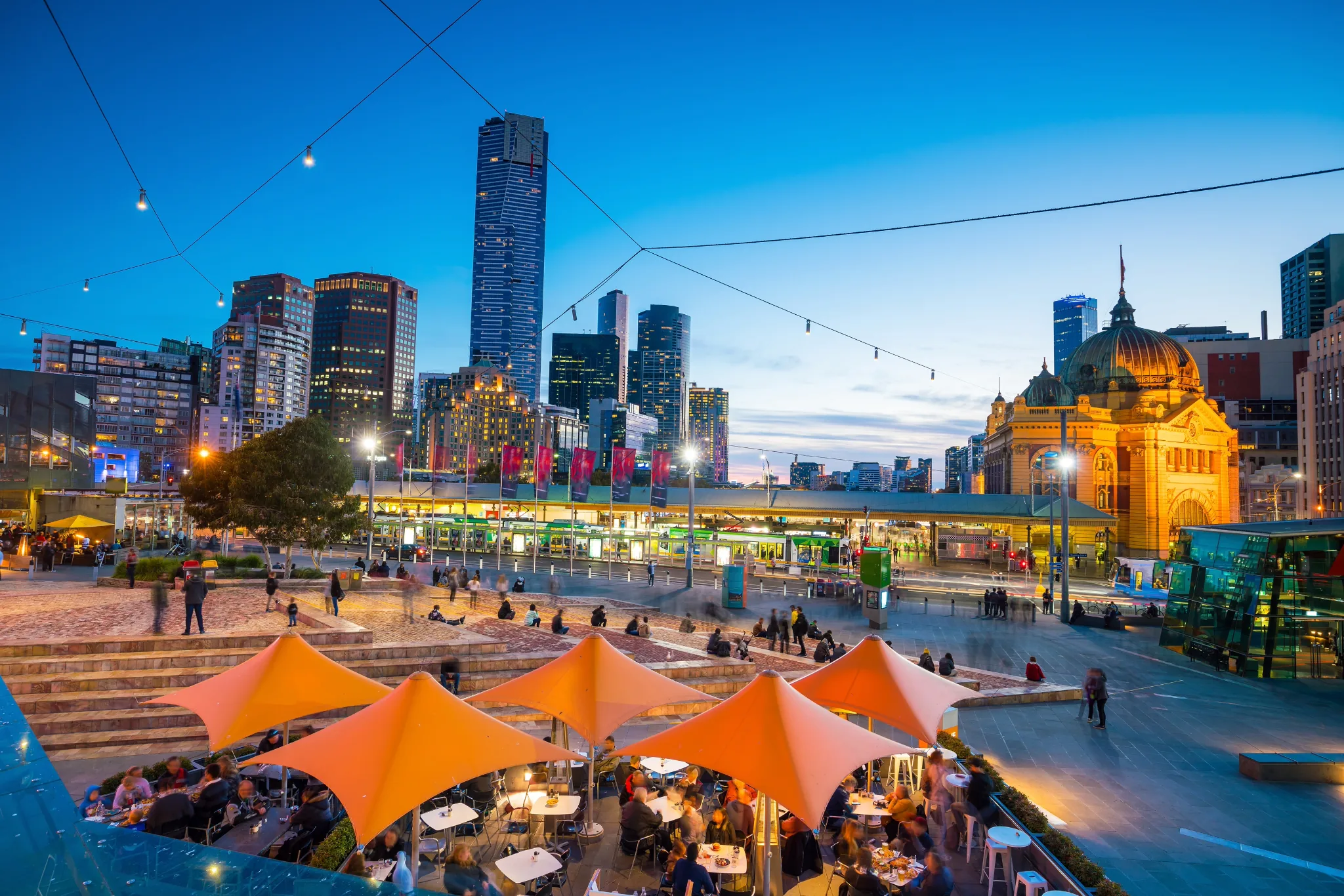 Melbourne city and Flinders Street Station at dusk