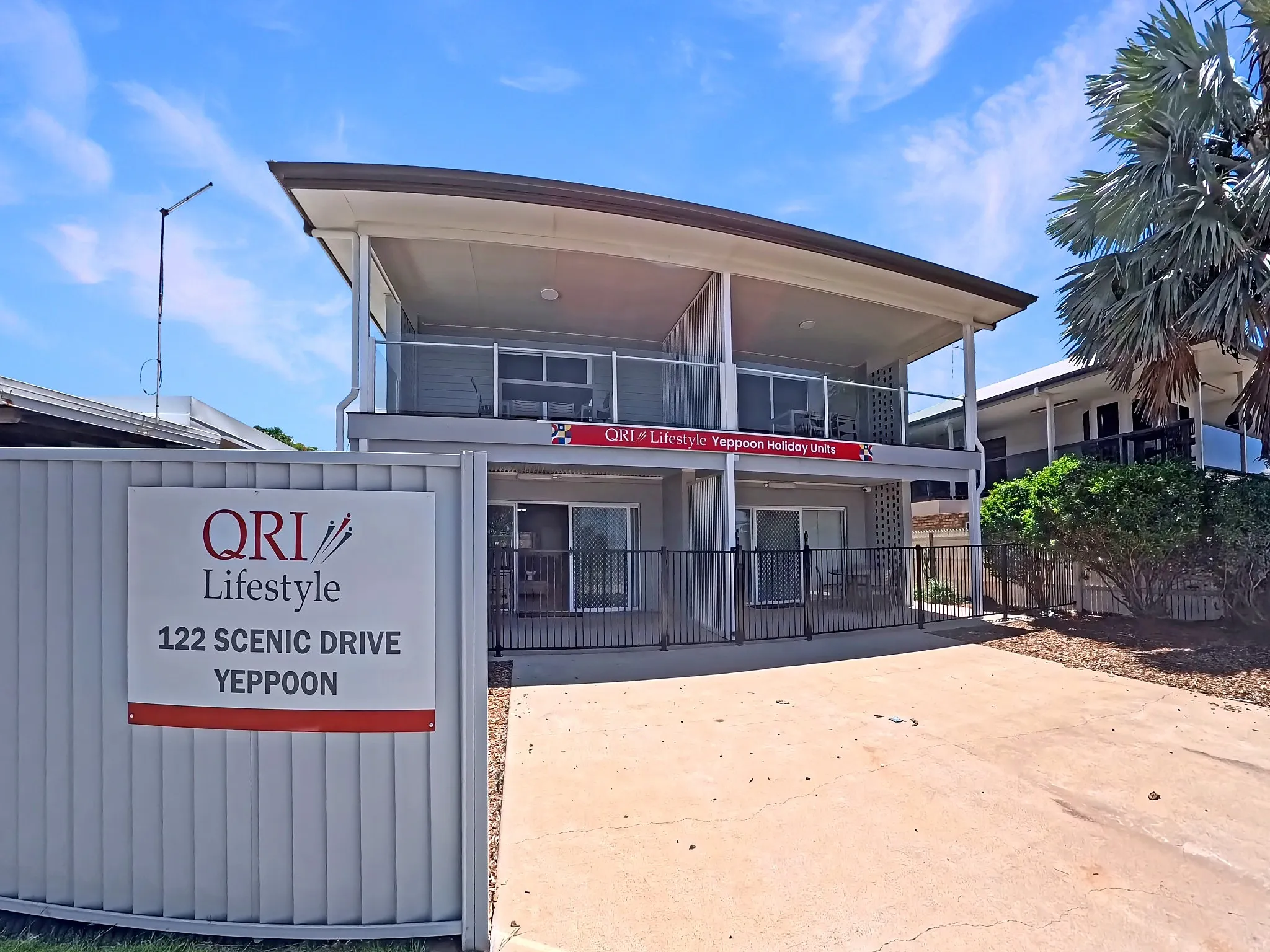 QRI Lifestyle Yeppoon Holiday Units exterior with sign